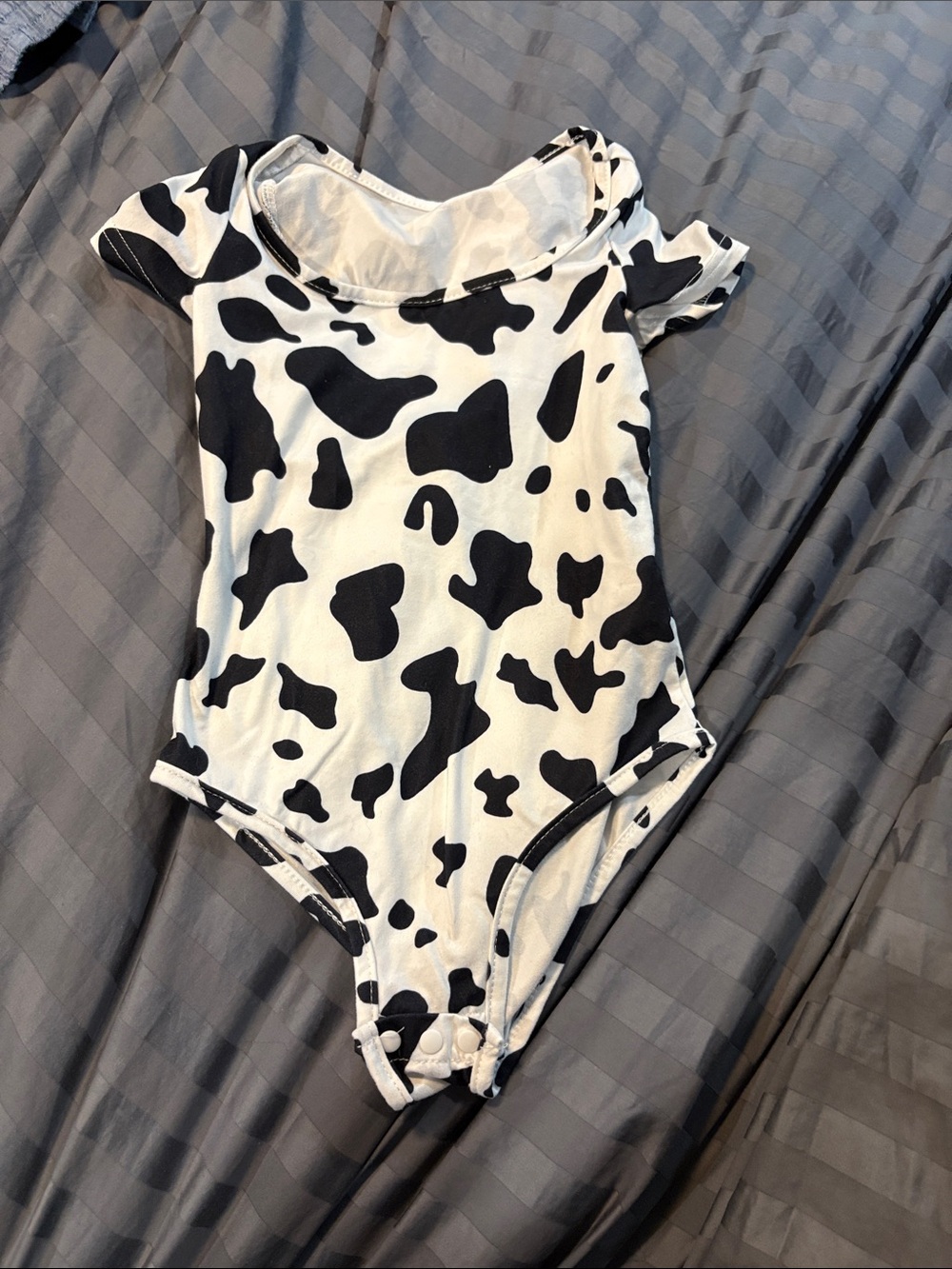 Kids Black & White Cow Print One-Piece Bodysuit